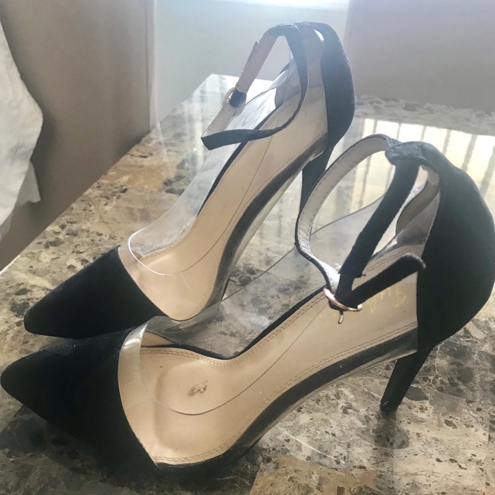 Black pointed toe heels